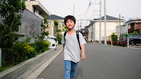 Monzenmachi/Getty Images Japan is one of the safest countries for families, and children regularly walk to school on their own (Credit: Monzenmachi/Getty Images)