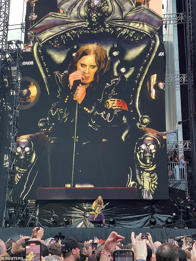 Ozzy Osbourne is seen on a screen as he performs at the Black Sabbath concert on July 5