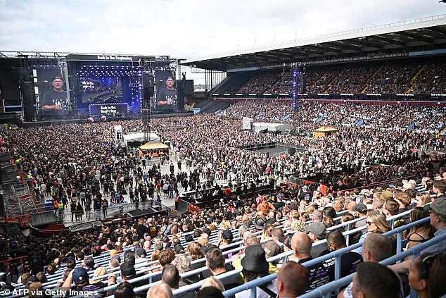The Villa Park crowd watch support acts during the 'Back to The Beginning' gig on July 5