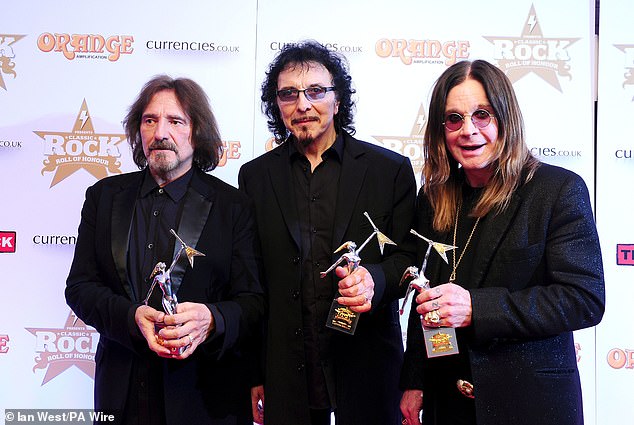 Geezer Butler, Tommy Iommi and Ozzy Osbourne from Black Sabbath at the Classic Rock Roll of Honour at The Roundhouse in Camden in November 2013